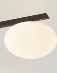 Floating Arm Globe Ceiling Lamp