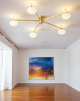 Floating Arm Globe Ceiling Lamp
